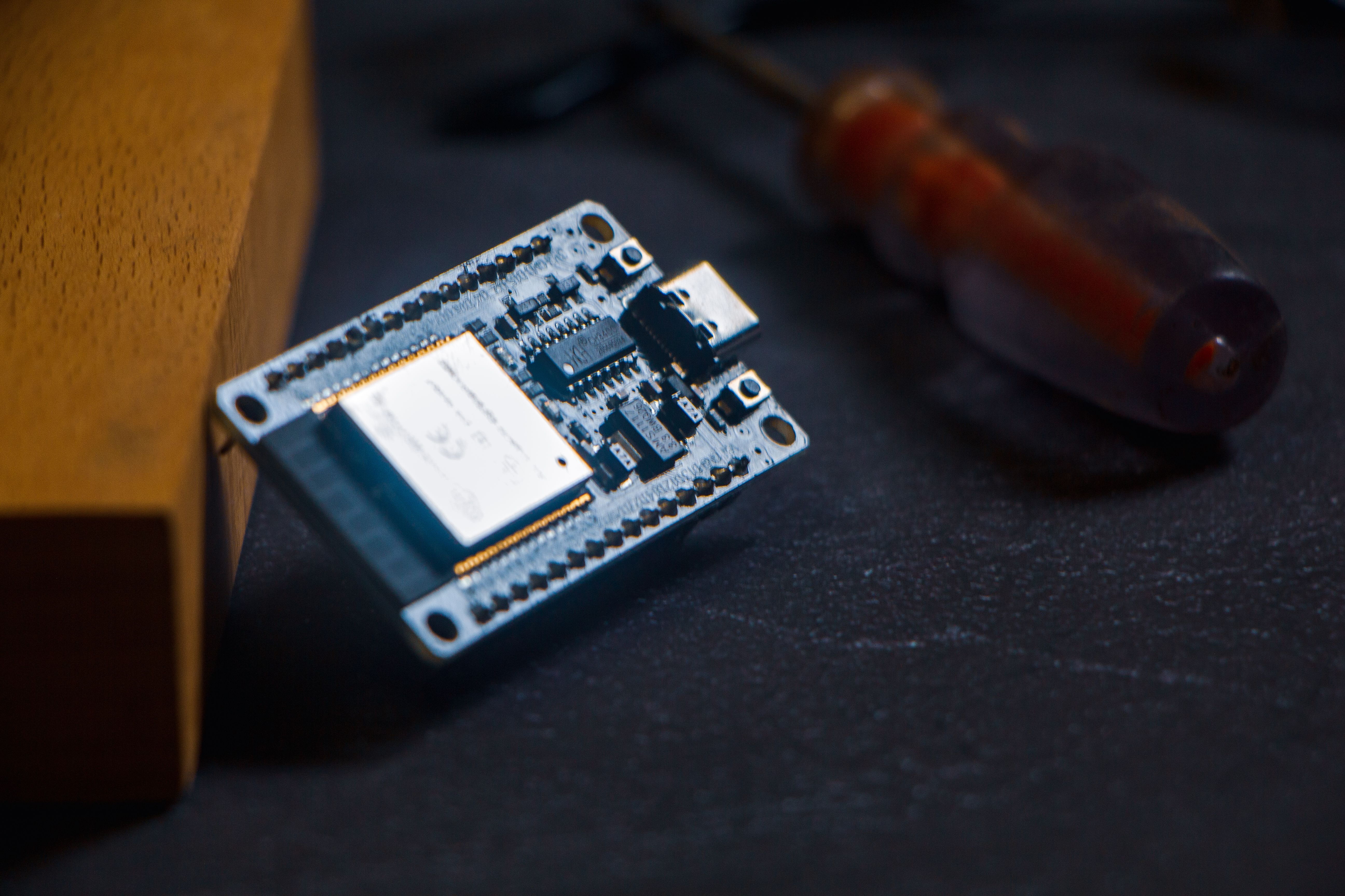 Close-up of an electronics development board on a workbench